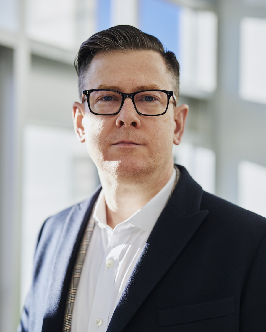 A solicitor in a dark blazer